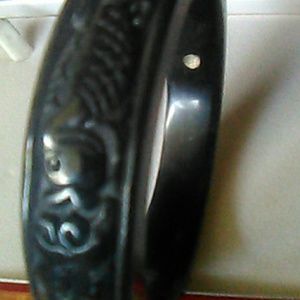 Black purple carved jade bangle signed ww
